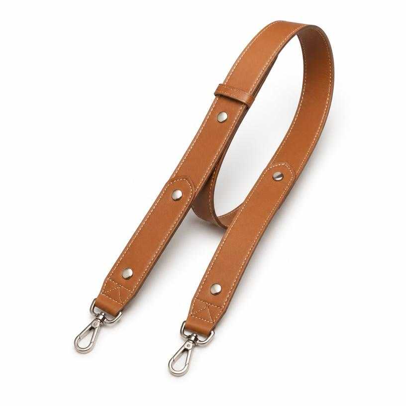 Generated item image of tan brown riveted leather crossbody strap