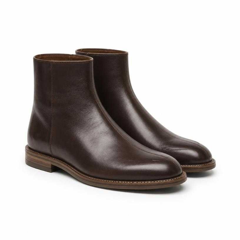 dark brown ankle height polished leather boots